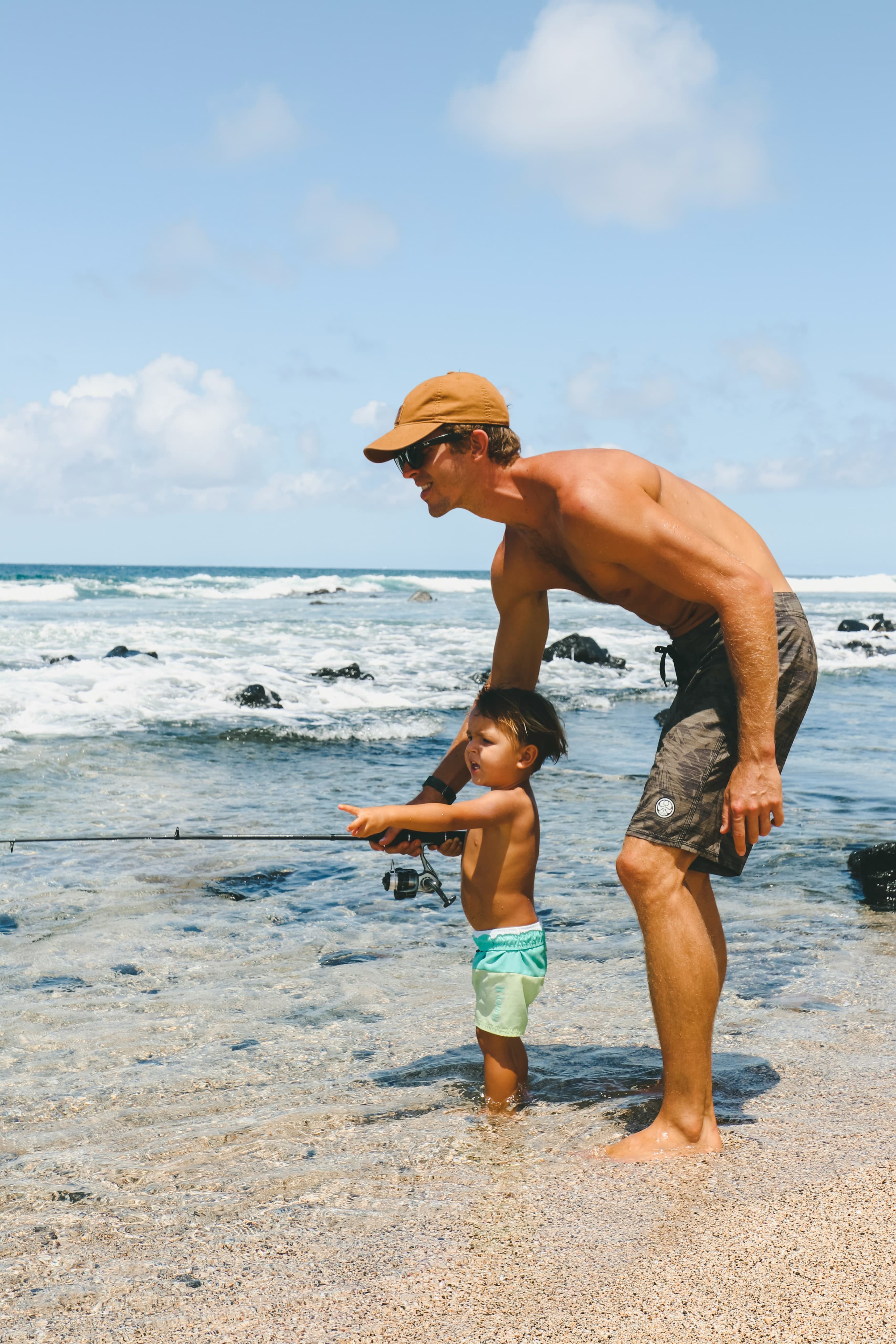 Father and child on beach